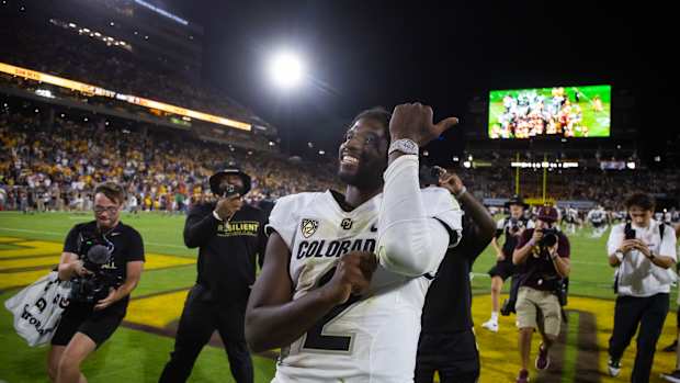 Colorado Buffaloes quarterback Shedeur Sanders (2) celebrates after defeating the Arizona State Sun Devils at Mountain America Stadium, Home of the ASU Sun Devils